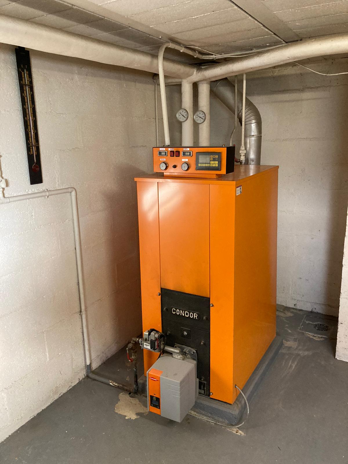 réalisation plombier chauffagiste Val‑d’Oise – Pose d'une chaudière Condor en Val‑d’Oise.